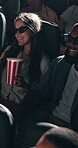 3d glasses, movie and couple laugh in cinema audience with popcorn for modern entertainment. Theatre, interracial people and happy for show, comedy and watching with augmented vision and illusion