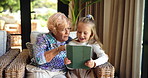 Grandmother, kid and learning with tablet in home, storytelling and play game on internet. Grandparent, child and girl with technology in living room for education, entertainment or talking together