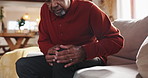 Relax, home and senior man with knee pain, injury or muscle sprain in living room at house. Arthritis, medical emergency and elderly male person with torn ligament, joint or inflammation in leg.