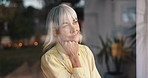 Home, window and thinking with senior woman, nostalgia and memory with retirement. Pensioner, apartment and mature person with ideas, decision and thoughtful with wonder, choice and daydreaming