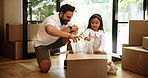 Unpacking, box and kid with father for real estate loan, property relocation or smile in new home. Child, girl and dad moving with package for mortgage, belongings or help for unboxing in dream house