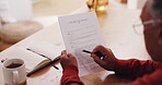 Pen, reading and will with man in living room of home for legal documents or paperwork from above. Contract, planning and security with senior person in apartment for review of inheritance contract