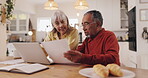 Finance, senior couple or laptop with documents in home for asset management, budget planning or account review. Interracial people, talking or retirement funding for life insurance or online banking