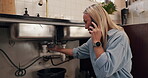 Leak, phone call and pipes with woman in kitchen of home for assistance, help or service. Communication, emergency and plumbing with person in apartment for conversation, maintenance or repair