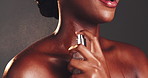 Perfume, spray and fragrance with black woman for beauty, skincare and cosmetics on studio background. Smile, mist and model with body product, parfume and essence for luxury smell and aesthetic