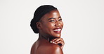 Skincare, beauty and face of black woman in studio with health, natural or facial routine. Laughing, cosmetic and portrait of African female person with glow dermatology treatment by white background
