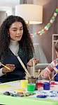 Teacher, painting and children in class for art lesson, talking and smile with color, craft and creativity. Drawing, watercolor and woman with students for artwork, paintbrush and preschool activity