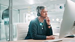 Call center, stress and mature woman in office for customer service, online mistake and CRM support. Professional consultant, problem and worker on computer for feedback, contact us and advice