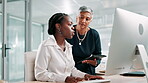 Call center, women and manager with advice, computer and explaining work to trainee, pointing or online. Training, mature mentor and helping employee for telemarketing, teamwork or planning for sales