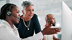 Call center, manager and women with computer, pointing and advice for work in business and explaining. Training, mature mentor and helping employee for telemarketing, teamwork and planning for sales