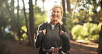 Hiking, mature woman and face in forest for adventure, retirement hobby and cardio wellness. Senior person, smile and portrait with backpack for trekking, explore and holiday sightseeing in woods