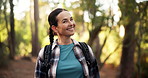 Face, happy and woman hiking in woods for trekking adventure, travel and fitness holiday. Portrait, female person and thinking for backpacking hobby, sightseeing and explore journey for getaway trip