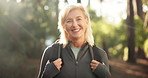 Face, mature woman and hiking in forest for trekking adventure, travel and fitness holiday. Portrait, female person and backpacking in woods for hobby, sightseeing and explore journey of getaway trip