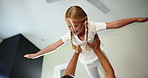 Happy girl, daughter and playing with parent in air for aeroplane, bonding or weekend at home. Kid, flying or guardian lifting child with smile for free time, playful imagination or balance at house