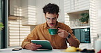 Home, man and coffee with tablet for remote work, research information and news story for reading. Kitchen, freelancer and content writer with digital for blog website, online article and blowing tea