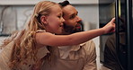 Baking, oven and dad with child waiting for learning to make biscuits, dessert and pastry. Family, kitchen and father with girl with homemade treats, muffins or cookies for bonding, help and excited