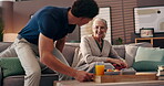 Caregiver, old woman and breakfast tray with meal for eating, health and wellness at retirement home. Knitting, homecare service and healthcare worker with senior person for morning food nutrition