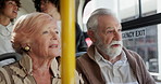 Senior man, woman and talk in bus on travel, point and search for landmark, location or sightseeing. Elderly couple, people and discussion for direction on trip with public transportation for drive