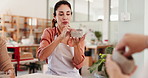 Woman, teaching and molding clay for pottery with sculpture design, learning technique and process. People, potter and instructions for craft production, crafting demonstration and creative workshop