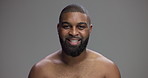 Studio, black man and face with smile for skincare, hygiene and model with confidence for wellness. Mockup space, male person and happiness in portrait for dermatology, cosmetics and gray background
