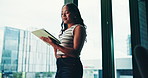 Tablet, thinking and businesswoman by window in office for investment ideas, decision or choice. Digital technology, planning and female financial analyst with online, finance or forecasting report.
