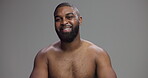 Studio, black man and face with confidence for skincare, hygiene and model with happiness for wellness. Mockup space, male person and smile in portrait for dermatology, cosmetics and gray background