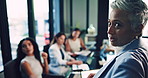 Business woman, manager and presentation with team in conference for meeting, discussion or proposal. Female person, executive or leader talking to group or staff for ideas or company plan at office