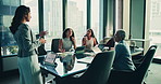 Business woman, meeting and presentation with team in conference for project discussion or proposal. Female person, speaker or employee talking to group or staff for idea or company plan at workplace