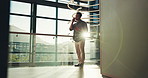 Businessman, phone call and negotiation by windows for deal, real estate sale and lens flare. Realtor, communication and person for property contact or discussion, client and online consultation
