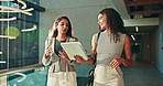 Meeting, tablet and business women in lobby for online project, collaboration and talking. Professional, corporate and workers in conversation on tech for research, website and planning in office