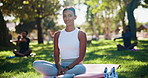 Yoga, happy and face of woman in nature for exercise, workout and training outdoor in morning. Park, pilates and portrait of person resting, calm and relax for wellness, health or zen energy on grass