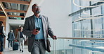 Phone, suitcase and typing with business man at conference for B2b manager, seminar speaker and contact. Convention center, walking and networking with person in lobby for travel, event and expo