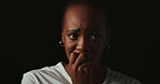 Stress, worry and face of black woman on dark background with fear, nervous and confused expression. Scared, anxiety and isolated female person with phobia, emotions and crisis reaction in studio