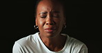 Crying, mental health and woman in studio sad for trauma, emotional abuse and bipolar disorder. Psychology, facial expression and person with anxiety, depression and stress on black background