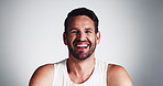 Face, man and laughing for skincare in studio for funny joke, facial treatment and cosmetics glow. Portrait, male person and humor for dermatology results, self care and beard on white background