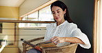 Home, reading book and woman on sofa, thinking and novel with knowledge, learning and leisure. Fantasy, apartment and mature person in lounge, literature and calm with wonder, storytelling and hobby