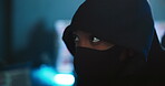 Night, hacker and person with mask, cybercrime and mysterious for ransomware in office, spy and thief. Anonymous, criminal and coder with hoodie for phishing, programmer and security breach for scam