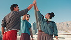 Outdoor, friends and high five with smile for fitness, support and solidarity for training by blue sky. Bridge, people and happy with applause for motivation, celebrate and synergy for exercise goals