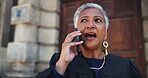 Talking, woman and phone call in city, frustrated and communication with contact, attorney and corporate. Outdoor, advocate and mature person with mobile for legal advice, angry or file for lawsuit