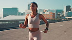Running, road and fitness with black woman in city for marathon training, health and cardio challenge. Energy, competition and exercise with person in street for sports athlete, workout and wellness