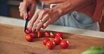 Kitchen counter, hands and cutting of vegetables, meal prep and healthy diet for lunch and nutrition. Home, nutritionist and person with process for salad, vegan and culinary skills with ingredients