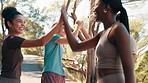 Group, high five and happy for fitness at park with cheers, applause or support for challenge in summer. People, men and women with celebration, win and smile with motivation for exercise in nature