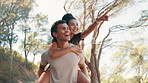 Smile, couple and piggyback for fitness in nature for exercise, fun training and playful break. Happy, people and hug with relationship, romance and bonding together for sightseeing of travel workout