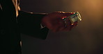 Hands, night or throwing cash for illegal business, money laundering or investment scam in crime syndicate. Roll, financial or fraudulent criminal with bank notes for stealing, corruption or capital