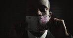 Businessman, mouth and bribe with money in studio for silence, fraud or crime by black background. African person, cash and corruption for secret deal, illegal transaction or face with pay in Nigeria