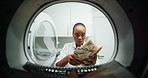 Washing machine, fraud and black woman with cash for money laundering and investment scam in crime. Laundry, wealth and person throwing bank notes for criminal funds, corruption and illegal business