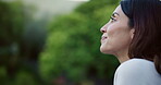 Future, space and thinking with woman in garden of home for hope, ideas or inspiration. Banner, happy and vision with mature person outdoor in backyard for thoughtful contemplation or wonder