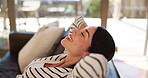 Woman, happy and stretching on sofa with relax, comfort and stress free on weekend in home. Profile, mature person or satisfaction in living room for day off, daydreaming and peace for self care