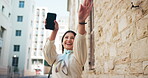 Excited, woman and dance with earphones in city for listening to music, streaming audio and travel fun. Person, laughing and movement with energy for playlist, morning commute and freedom for journey