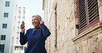 Mature woman, dance and earphones in city for listening to music, travel fun and good news. Female person, rhythm and movement with energy for playlist, morning commute and celebration for promotion